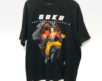 May include: Black t-shirt with a graphic of Goku from Dragon Ball Z in his Super Saiyan 4 form. The text "Goku Super Saiyan Level 4" is printed on the shirt.