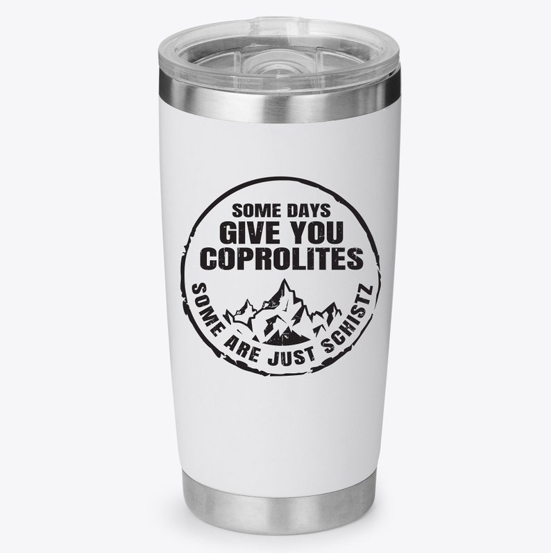 May include: White stainless steel travel mug with a black and white graphic that says "Some days give you coprolite. Some are just schist."
