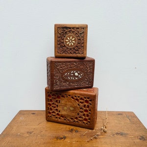 Selection of Individual Rustic Indian Hand Carved Rosewood Trinket or Jewellery Boxes with Bone, or Brass Inlay on a Brass Hinged Lid.