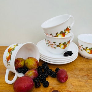 Set of Four Mid Century Arcopal France Opal Milk Glass Tea Cup and Saucer Apple Blossom Design
