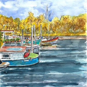 May include: A watercolour painting depicting a small marina with three boats moored. The boats are painted in shades of blue, green and white. The water is a dark blue with ripples. The background is a forest of trees with autumn foliage in shades of yellow, orange and brown. The artist's signature, "Marcos Moller", is in the bottom right corner.