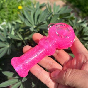 Pink Glitter Dolphin Glass Pipe: UV Reactive, Freezable, Collectible