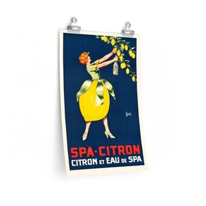 May include: Vintage poster advertising Spa-Citron, a lemon-flavored beverage. A woman dressed as a lemon is reaching for a bottle of the drink from a lemon tree. The poster is on a blue background with the text "Spa-Citron Citron et Eau de Spa" in red and white.