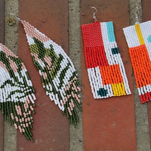 May include: Four pairs of long, beaded earrings with geometric patterns. The earrings are in various colors, including white, green, pink, red, orange, yellow, blue, and teal.