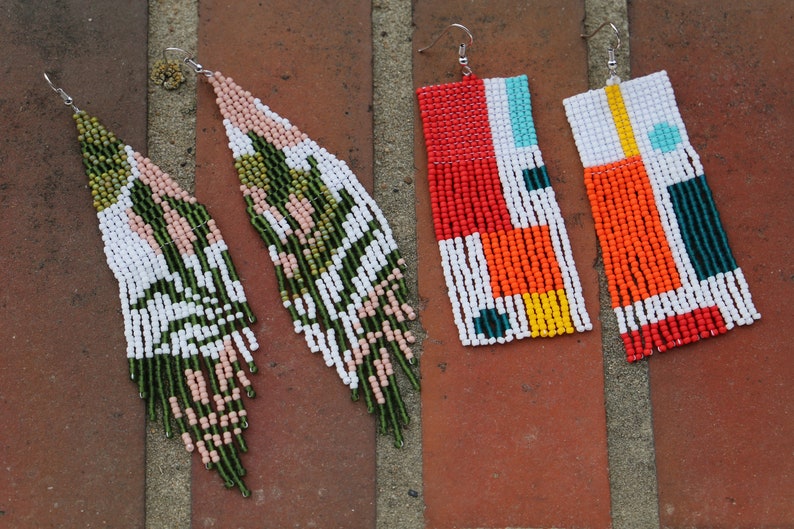 May include: Four pairs of long, beaded earrings with geometric patterns. The earrings are in various colors, including white, green, pink, red, orange, yellow, blue, and teal.