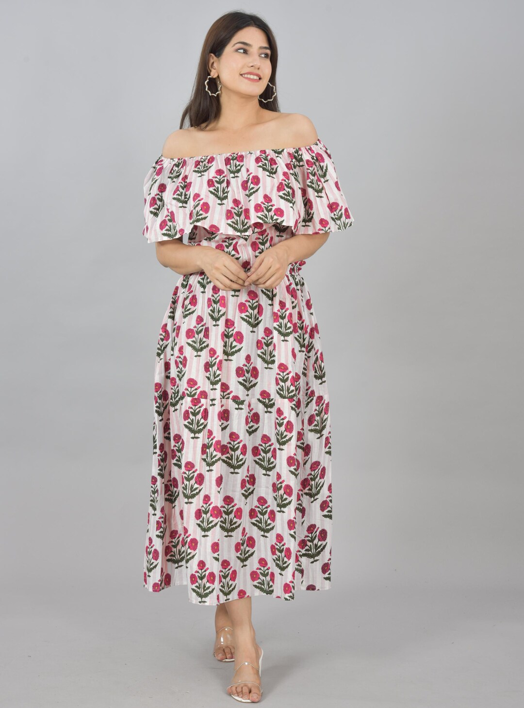 Off white hand block printed long dress with all-over Blue & Green coloured floral hand block print.
