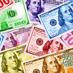 May include: A collage of colorful US $100 bills with different color schemes. The bills are arranged in a random pattern, with some overlapping. The text "NOT LEGAL TENDER" is visible on one of the bills.
