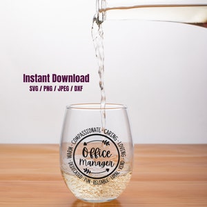 May include: A clear glass wine glass with a black circle design that says "Office Manager" with arrows and words like "warm, compassionate, caring, loving, dedicated, fun, reliable, loyal, kind".