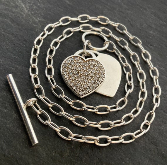 Sterling silver hammered heart bracelet with t-bar toggle fastening | The  British Craft House