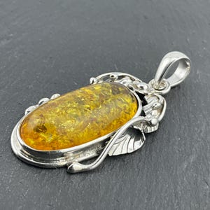 Vintage Amber Sterling Silver Oval Floral Pendant