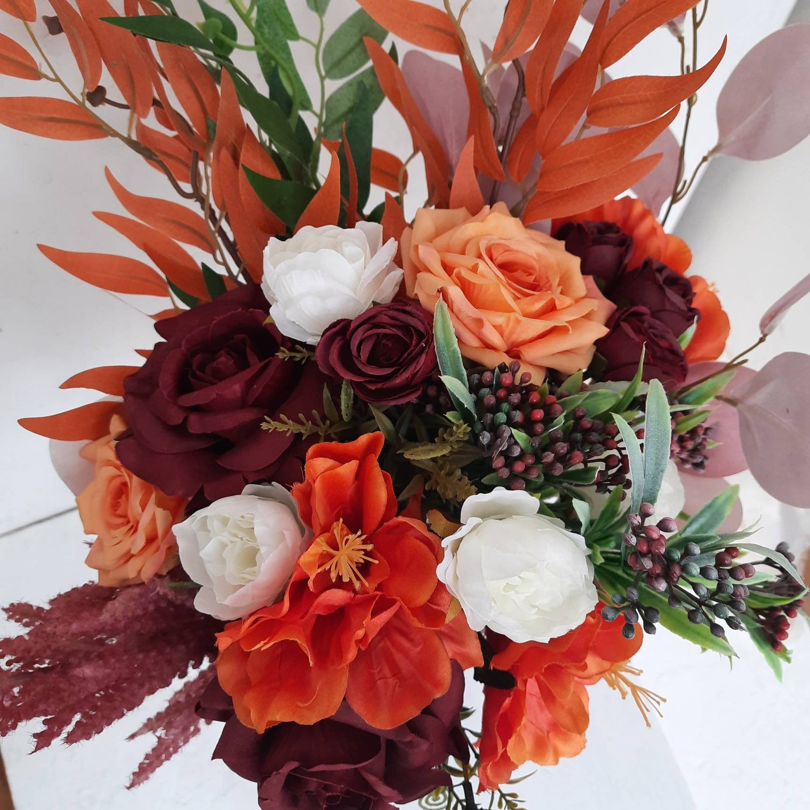 burnt orange flowers wedding bouquet