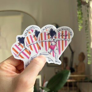 May include: Several stickers depicting a figure in a pink swimsuit with star details, set against a heart-shaped backdrop with orange and pink stripes. The text "SALBSCHTLI Club" is visible on each sticker.