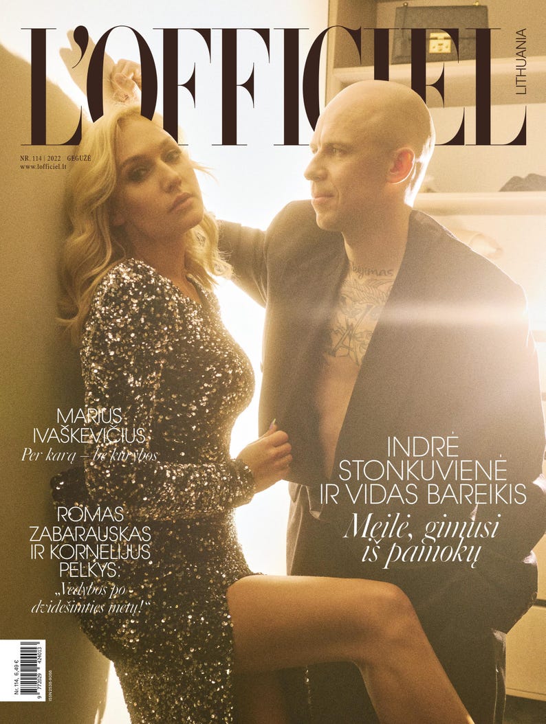 May include: A magazine cover featuring a couple in a romantic pose. The magazine is titled "L'Officiel" and the cover features the text "Marius Iva&scaron;kevičius: Per karą -  įe kar&scaron;ybą" and "Indre Stonkuvienė ir Vidas Bareikis: Meilė, gimusi i&scaron; pamokų".