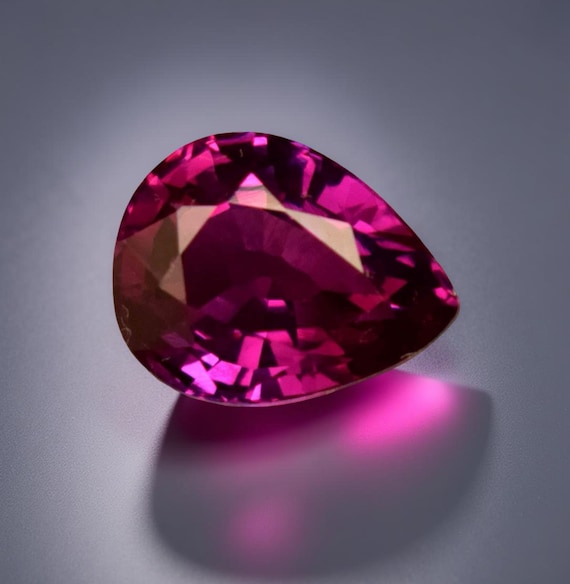Grenat rhodolite naturel : 1,05 carat pierre de naissance ovale de