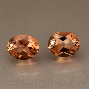 Pietra preziosa naturale di topazio imperiale di novembre, 7,05 ct, taglio ovale, coppia abbinata per orecchini, pietra preziosa sfusa con certificato