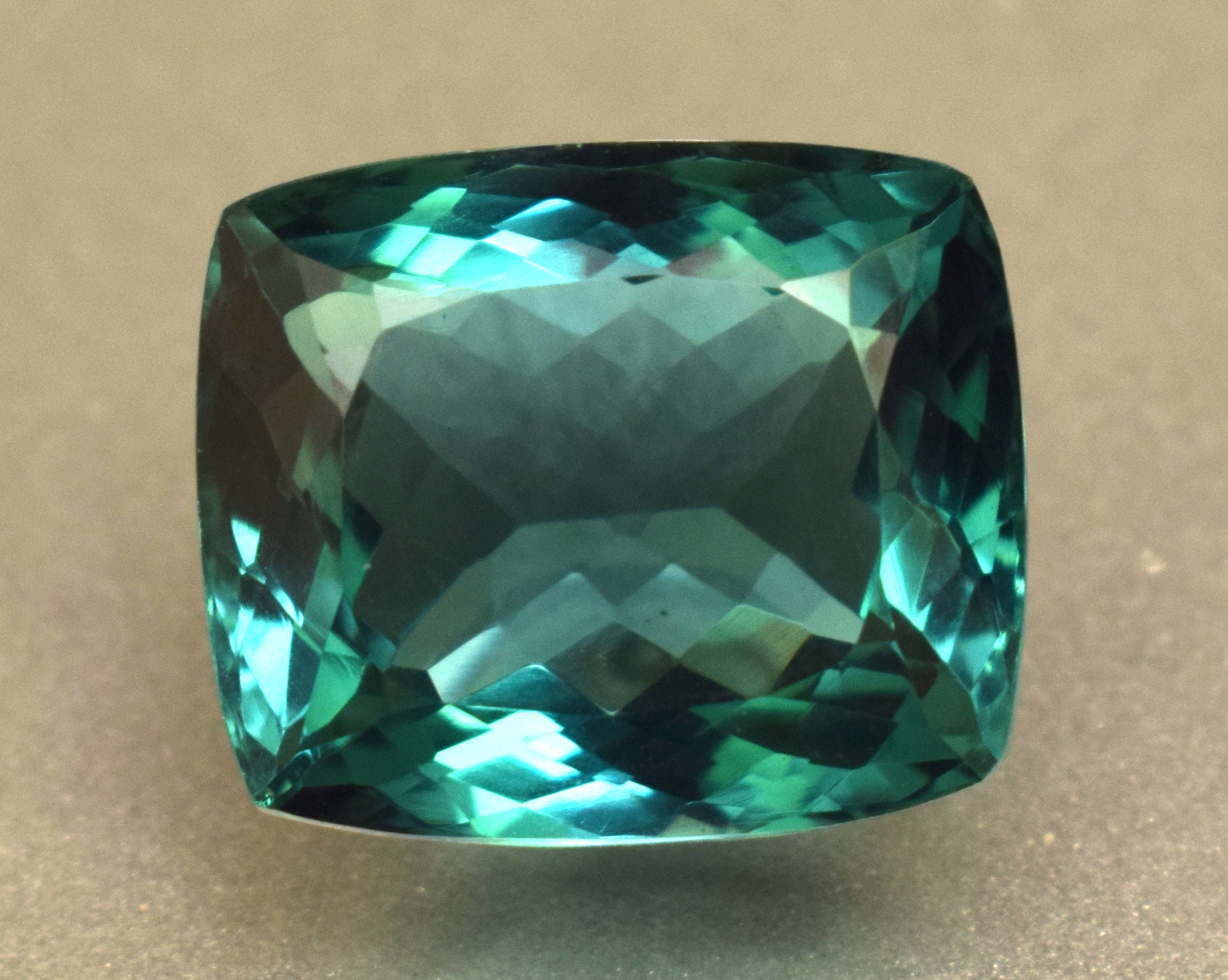 Bluish green gemstone deals