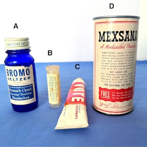 May include: A collection of old health and beauty items. It includes a blue Bromo Seltzer bottle, a small bottle of pills, a tube of YOTE toothpaste, and a can of Mexsana medicated powder. The items are displayed on a blue surface.