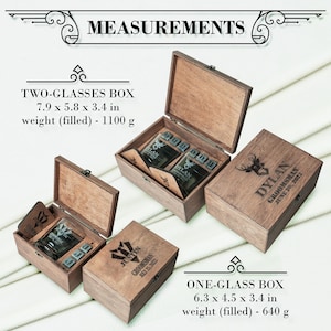 May include: Wooden gift boxes with engraved text and designs. The two-glass box measures 20 x 14.7 x 8.6 cm and weighs 1100 g when filled. The one-glass box measures 16 x 11.4 x 8.6 cm and weighs 640 g when filled.