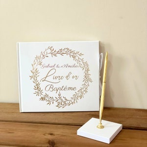 White guest book with gold plant crown