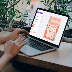May include: A laptop computer displaying a digital invitation with a pink, orange, and brown color scheme. The invitation features the text "Howdy Y'all" and "Jessica" with a horseshoe and cactus design.