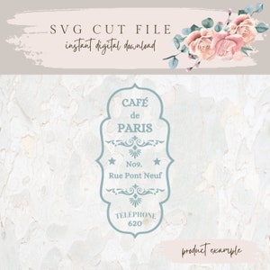 May include: A blue and white vintage-style cafe sign with the text "CAF&Eacute; de PARIS No9. Rue Pont Neuf T&Eacute;L&Eacute;PHONE 620". The sign is on a light blue and white woodgrain background.