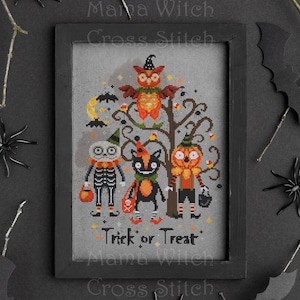 May include: Cross stitch pattern featuring a spooky owl, a skeleton, a cat, and a pumpkin character. The characters are dressed in costumes and holding trick-or-treat bags. The text "Trick or Treat" is stitched below the characters.