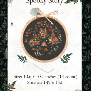 May include: Cross stitch pattern featuring four frogs wearing hats and gathered around a campfire. The pattern is on black Aida cloth and is framed in a wooden hoop. The pattern is titled "Spooky Story" and is 10.6 inches by 10.1 inches. The pattern is 149 stitches by 142 stitches.