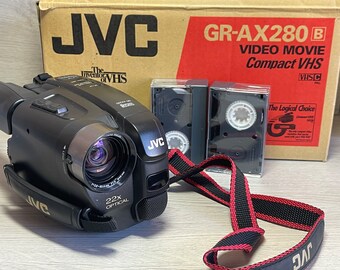 JVC GR-AX280 Compact VHSC Camcorder Optical 22x Zoom used with accesories