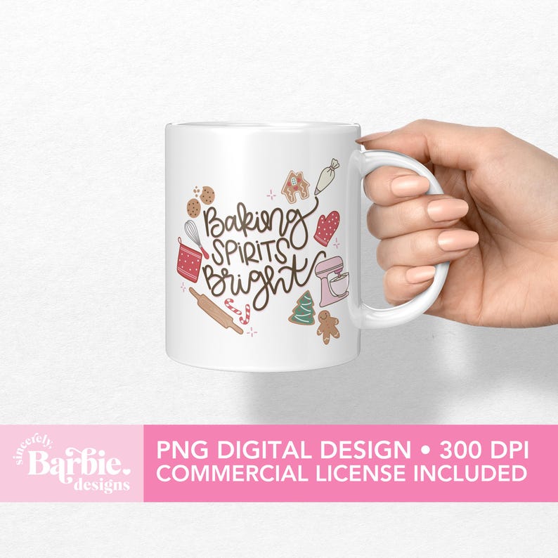 May include: White ceramic mug with the words "Baking Spirits Bright" in a whimsical font, surrounded by baking-themed illustrations. The mug features a handle and is held by a hand. The mug has a pink banner at the bottom with text.