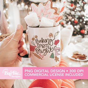 May include: A white mug with the text "Baking Spirits Bright" and baking-themed illustrations. The mug is filled with marshmallows, a gingerbread cookie, and a striped straw. The image also includes text that says "PNG DIGITAL DESIGN &bull; 300 DPI COMMERCIAL LICENSE INCLUDED."