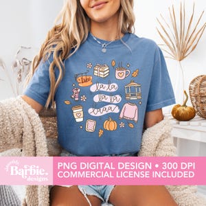 May include: A blue t-shirt with a colorful graphic design featuring the text "la la la la la la laaa" and various fall-themed illustrations. The design includes a coffee cup, pumpkin, sweater, and gift boxes. The image also includes the text "PNG DIGITAL DESIGN &bull; 300 DPI COMMERCIAL LICENSE INCLUDED".