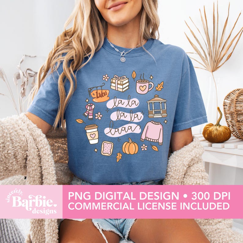 May include: A blue t-shirt with a colorful graphic design featuring the text "la la la la la la laaa" and various fall-themed illustrations. The design includes a coffee cup, pumpkin, sweater, and gift boxes. The image also includes the text "PNG DIGITAL DESIGN &bull; 300 DPI COMMERCIAL LICENSE INCLUDED".