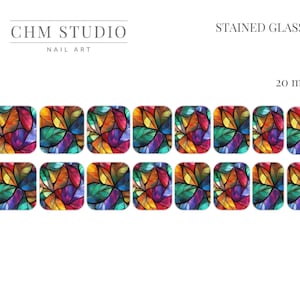 May include: Ten colourful stained glass nail decals, each measuring 20 mm. The decals feature a geometric pattern of leaves in shades of red, orange, yellow, green, blue, and purple.
