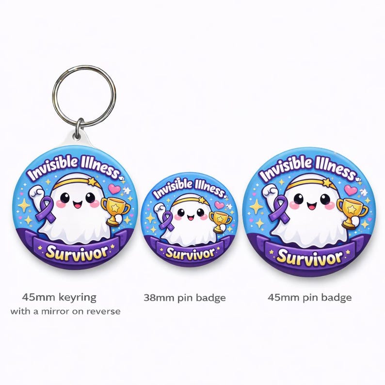 May include: A collection of round, blue and purple "Invisible Illness Survivor" badges and a keyring. Each features a cute ghost character holding a trophy and a purple ribbon. The keyring has a mirror on the reverse side.