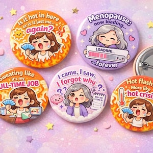 May include: A collection of round, colorful pinback buttons with humorous illustrations and text related to menopause and hot flashes. The buttons feature cartoon characters and phrases like "Is it hot in here?" and "Menopause: now loading."