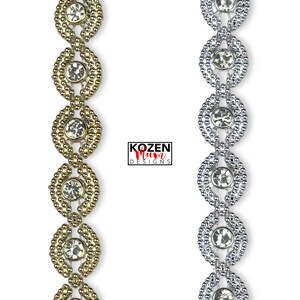 May include: Two vertical strips of decorative trim, one in gold and one in silver, featuring a repeating oval pattern with embedded clear rhinestones. The text KOZEN Mum DESIGNS is centered between the two strips of metallic beaded trim.