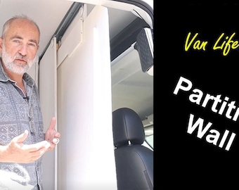 May include: A man stands in a van, explaining how to build a partition wall. The text "Van Life: Partition Wall" is displayed on a black background.