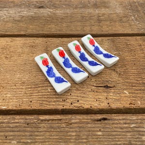 4 Porcelain Chop Stick Rests