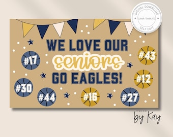 May include: A tan digital download template with the text "WE LOVE OUR seniors GO EAGLES!" in navy and gold. Basketball graphics with numbers 12, 16, 17, 27, 30, and 44 are scattered around the text. Navy, white, and gold pennants are at the top.