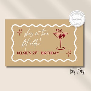 Puede incluir: Tarjeta de descarga digital de color beige con borde festoneado blanco. La tarjeta presenta el texto "shes a tini bit older" y "Kelsie's 21st Birthday" en borgoña. También se muestra una copa de martini con cerezas.