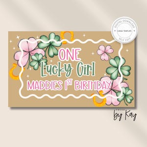 May include: A digital Canva template with a brown background, featuring the text "ONE Lucky Girl MADDIES 1ST BIRTHDAY". The design includes pink and green shamrocks, gold horseshoes, and a white wavy border. The words "DIGITAL DOWNLOAD" and "SELF EDIT" are also present.