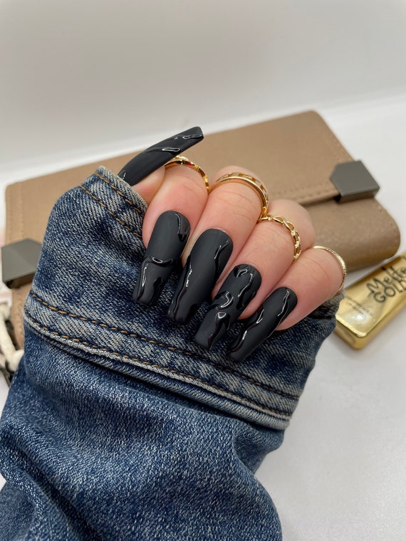 Still styling out the short nails. DIY matte black with a glossy tip. Not  perfect by any means, but thought I'd try this style myself as I've  previously had it done at