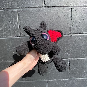 May include: A set of three ceramic mugs with a speckled, matte finish. The mugs are in shades of cream, light gray, and dark gray. Each mug has a simple, minimalist design, perfect for coffee or tea.