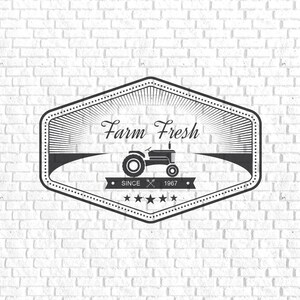 May include: Black and white illustration of a tractor with the text "Farm Fresh" and "Since 1967" on a white brick background.