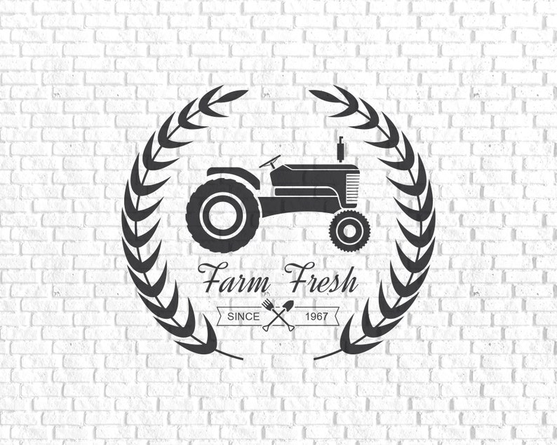 May include: Black and white illustration of a tractor with a wreath of wheat around it. The text "Farm Fresh" is written below the tractor with the words "Since 1967" below that.