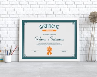 May include: A framed certificate of appreciation with a teal border and a white background. The certificate reads "CERTIFICATE OF APPRECIATION" and "THIS CERTIFICATE IS PRESENTED TO Name Surname".