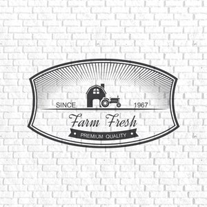 May include: Black and white logo with a farmhouse and tractor, surrounded by a sunburst design. The text reads "Since 1967 Farm Fresh Premium Quality".