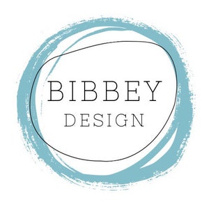 May include: A blue circle with a white background and the text "BIBBEY DESIGN" in black.