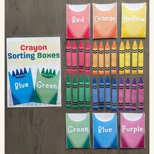 May include: Crayon Sorting Boxes activity set with colorful crayon boxes labeled red, orange, yellow, blue, green, and purple. The set includes a printable sheet with the title "Crayon Sorting Boxes" and two boxes labeled "Blue" and "Green".