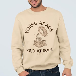 Young at Age Old at Soul Sweatshirt: Unisex Crewneck